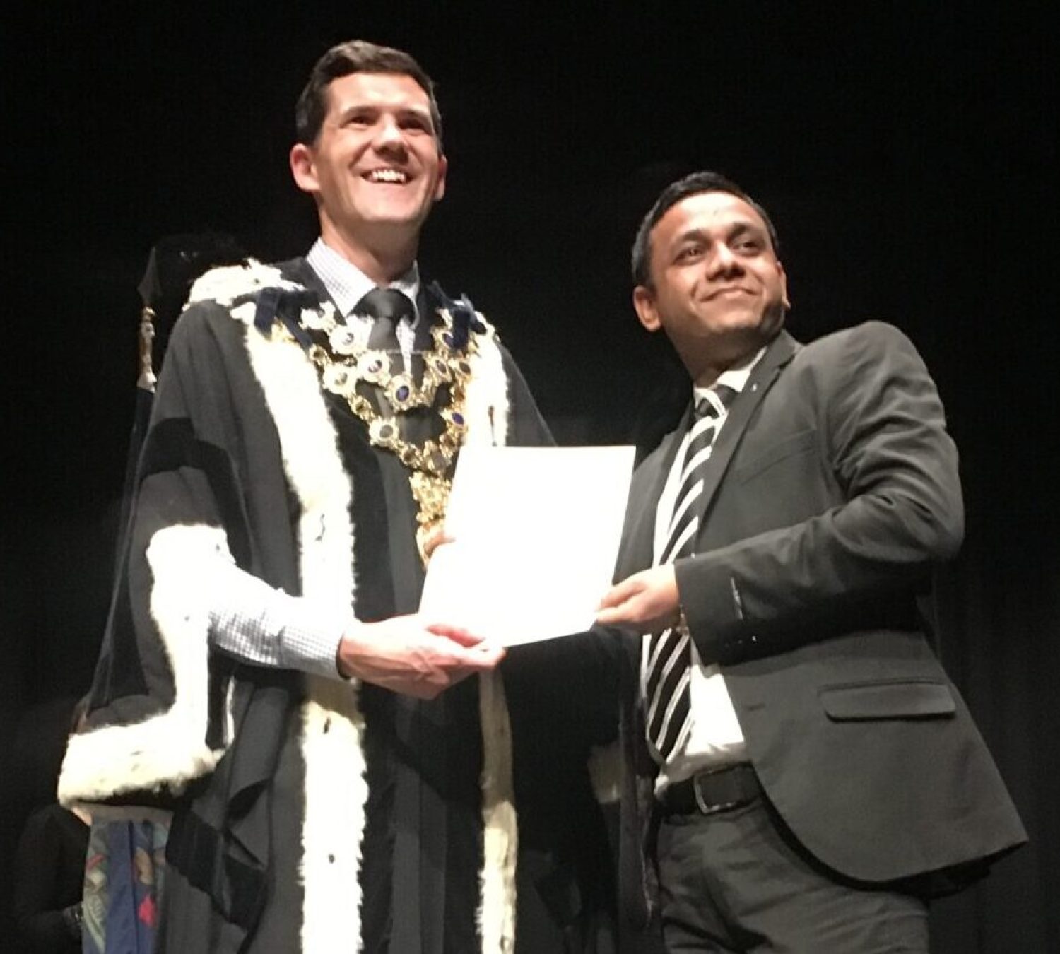 Arif is receiving the certificate of the New Zealand Citizenship by the Mayer of the Wellington (Justin Lester in 2018).